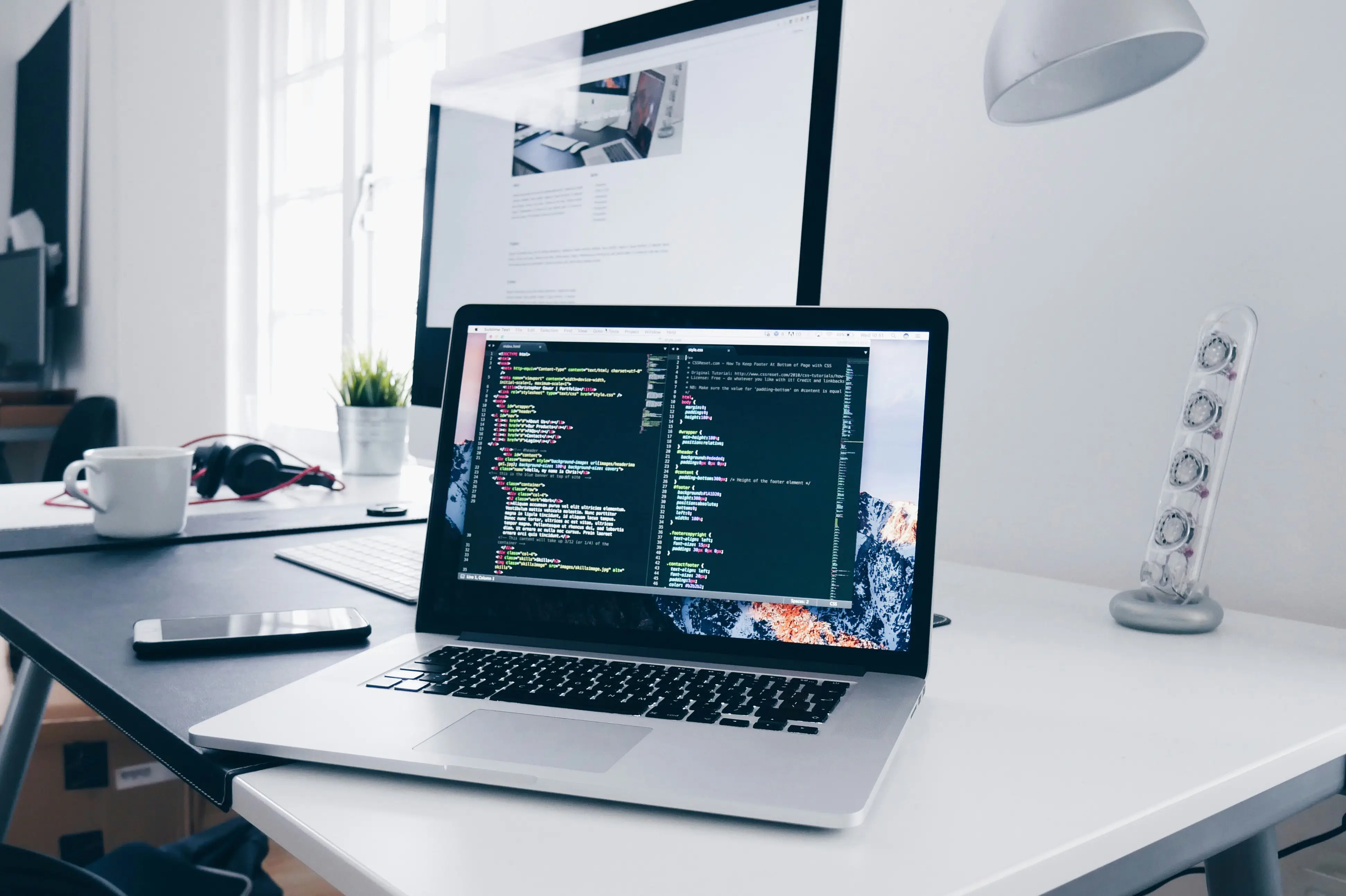 Laptop workspace for web development article